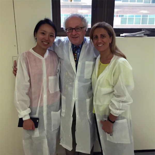 Dr. Gary Herskovits with two members of staff